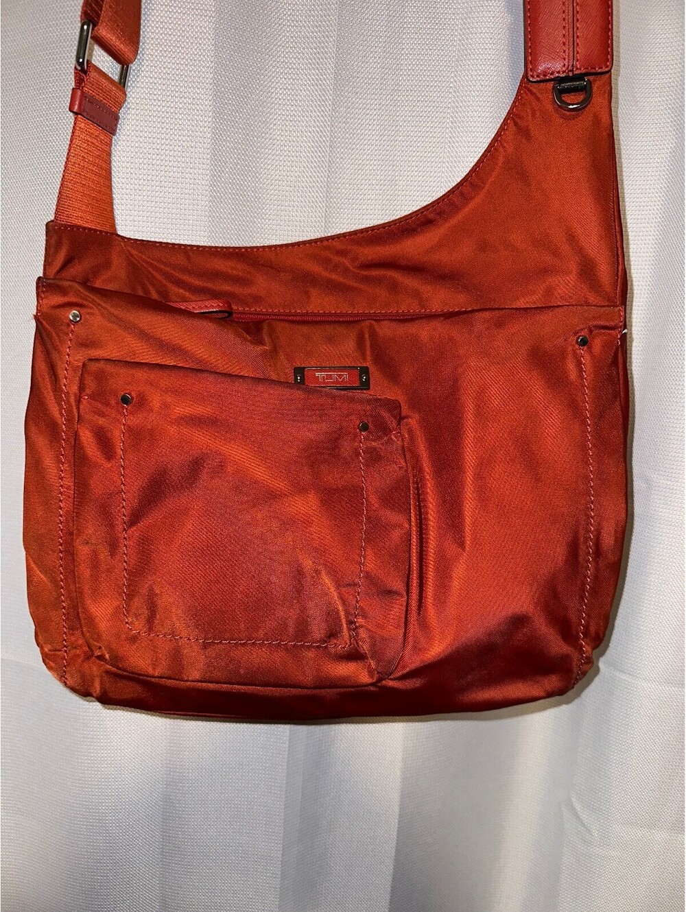 Tumi Women's Orange Voyageur Sumatra Crossbody/Shoulder Bag